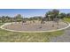 A wide view of the community playground, with swing sets and other structures for  at 11839 E Maplewood Ave, Greenwood Village, CO 80111