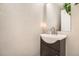 Stylish powder room featuring a modern vanity and neutral color palette at 11839 E Maplewood Ave, Greenwood Village, CO 80111