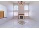 Spacious living room with high ceilings and fireplace at 154 Cisne Cir, Brighton, CO 80601