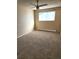 Neutral bedroom featuring carpeted floors and a window at 234 S Brentwood St # 105, Lakewood, CO 80226