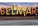 Entrance to Belmar featuring illuminated sign against a vibrant dusk sky in Downtown Lakewood at 234 S Brentwood St # 105, Lakewood, CO 80226