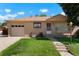 Charming one-story home with brick exterior, well-manicured lawn, and attached garage, perfect for comfortable living at 1803 Graves Ct, Northglenn, CO 80233