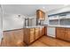Well-lit kitchen area features wooden cabinets and flows into the main living space at 10208 E Jewell Ave # 18, Aurora, CO 80247