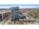 Modern high-rise featuring a rooftop pool and outdoor lounge area with scenic neighborhood views at 4200 W 17Th Ave # 211, Denver, CO 80204