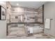 Spa-like bathroom with a walk-in shower, a soaking tub, and elegant tile work at 4200 W 17Th Ave # 211, Denver, CO 80204