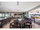 The community clubhouse features a dining and entertaining space with an open kitchen and access to an outdoor grilling area at 4200 W 17Th Ave # 211, Denver, CO 80204