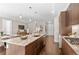 Large kitchen island perfect for entertaining with modern appliances and gas range at 4200 W 17Th Ave # 211, Denver, CO 80204