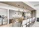 Gourmet kitchen boasts sleek countertops, stainless steel appliances, and an island with bar seating at 4200 W 17Th Ave # 211, Denver, CO 80204
