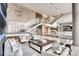 Grand lobby area with comfortable seating, modern lighting, and a sophisticated atmosphere at 4200 W 17Th Ave # 211, Denver, CO 80204