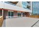 Spacious patio area with sleek design, offering an ideal space for relaxing and enjoying the outdoors at 4200 W 17Th Ave # 211, Denver, CO 80204