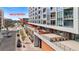 Expansive condo patio offering ample space for entertaining and outdoor living, plus great views at 4200 W 17Th Ave # 211, Denver, CO 80204
