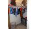 Organized walk-in closet with hanging clothes and storage shelves at 1851 S Dunkirk St # 201, Aurora, CO 80017
