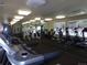 Well-equipped fitness center featuring treadmills, ellipticals, and weight machines at 1851 S Dunkirk St # 201, Aurora, CO 80017