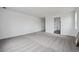 Spacious bedroom with plush carpeting and ample natural light at 25283 E Warren Pl, Aurora, CO 80018