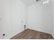 A clean laundry room with hookups and vinyl floors at 25283 E Warren Pl, Aurora, CO 80018