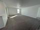 Open loft space with carpet flooring, and ample natural light at 3909 N Shawnee St, Aurora, CO 80019