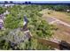 Overhead capture shows a beautiful stream meandering through a green neighborhood near walking paths at 2770 S Elmira St # 42, Denver, CO 80231