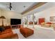 Expansive living area featuring a media center, seating, and open access to other living spaces at 2770 S Elmira St # 42, Denver, CO 80231