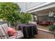 Cozy outdoor patio showcasing comfortable seating and a charming table setting for al fresco dining at 2770 S Elmira St # 42, Denver, CO 80231