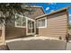 Home's exterior with a concrete patio and view of the backyard at 5463 Rockhampton Cir, Highlands Ranch, CO 80130