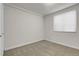 Carpeted bedroom with a window allowing natural light and a closet for storage at 5463 Rockhampton Cir, Highlands Ranch, CO 80130