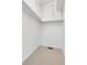 Walk-in closet with carpet and built in shelving for storage at 5463 Rockhampton Cir, Highlands Ranch, CO 80130