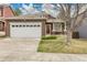 Charming single-Gathering home showcasing a two-car garage, manicured lawn and inviting curb appeal in a residential neighborhood at 5463 Rockhampton Cir, Highlands Ranch, CO 80130