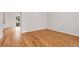 Hardwood floors and white walls create a bright and spacious feel in this living area at 5463 Rockhampton Cir, Highlands Ranch, CO 80130