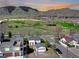 Picturesque street view showing homes near a green space and mountain range at 2201 Illinois St, Golden, CO 80401
