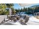 Backyard patio with fire pit and mountain views at 2824 Valley Park Dr, Larkspur, CO 80118