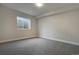 Bedroom featuring neutral paint, carpet flooring, and a window providing natural light at 4121 Mesa Top Dr, Monument, CO 80132