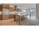 Modern kitchen featuring a large island, stainless steel appliances, and mountain view at 4121 Mesa Top Dr, Monument, CO 80132