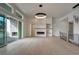 Spacious living room with fireplace and modern lighting at 4121 Mesa Top Dr, Monument, CO 80132