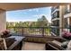 Inviting balcony with outdoor seating, flowers and furniture with a scenic view at 13961 E Marina Dr # 414, Aurora, CO 80014