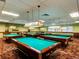 A full view of a game room containing multiple billiard tables at 13961 E Marina Dr # 414, Aurora, CO 80014