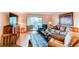 Comfortable living room with sliding glass doors to outside balcony area with great natural light at 13961 E Marina Dr # 414, Aurora, CO 80014