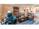 Cozy living room with comfortable seating, soft lighting, and nice decorative touches at 13961 E Marina Dr # 414, Aurora, CO 80014
