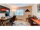 Home office features wood floors and large window at 13961 E Marina Dr # 414, Aurora, CO 80014