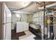 Functional laundry room with washer, dryer, and utility sink at 2301 Vine St, Denver, CO 80205