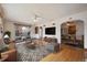 Bright living room with hardwood floors, ample seating, and natural light at 2301 Vine St, Denver, CO 80205