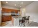 Well-equipped kitchen with granite countertops and ample cabinetry at 12444 Madison Way, Thornton, CO 80241