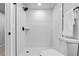 Clean bathroom with a large shower and toilet at 2610 W 90Th Pl, Denver, CO 80260