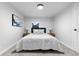 Bright bedroom with comfortable bed and neutral decor at 2610 W 90Th Pl, Denver, CO 80260