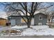 Updated gray house with a large yard at 2610 W 90Th Pl, Denver, CO 80260