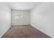 Simple bedroom with neutral wall paint and carpet at 5928 E Conservation Dr, Frederick, CO 80504