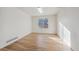 Light-filled bedroom with hardwood floors and a closet at 5928 E Conservation Dr, Frederick, CO 80504