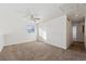 Spacious bedroom with ceiling fan and carpet at 5928 E Conservation Dr, Frederick, CO 80504