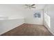 Upstairs bedroom with ceiling fan and carpet at 5928 E Conservation Dr, Frederick, CO 80504