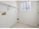 Laundry room with shelving and linoleum flooring at 5928 E Conservation Dr, Frederick, CO 80504