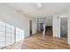 Living room with hardwood floors and a staircase at 5928 E Conservation Dr, Frederick, CO 80504